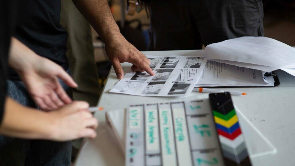 Creative Services Skystorm creative team brainstorming video concepts using storyboards and shot lists